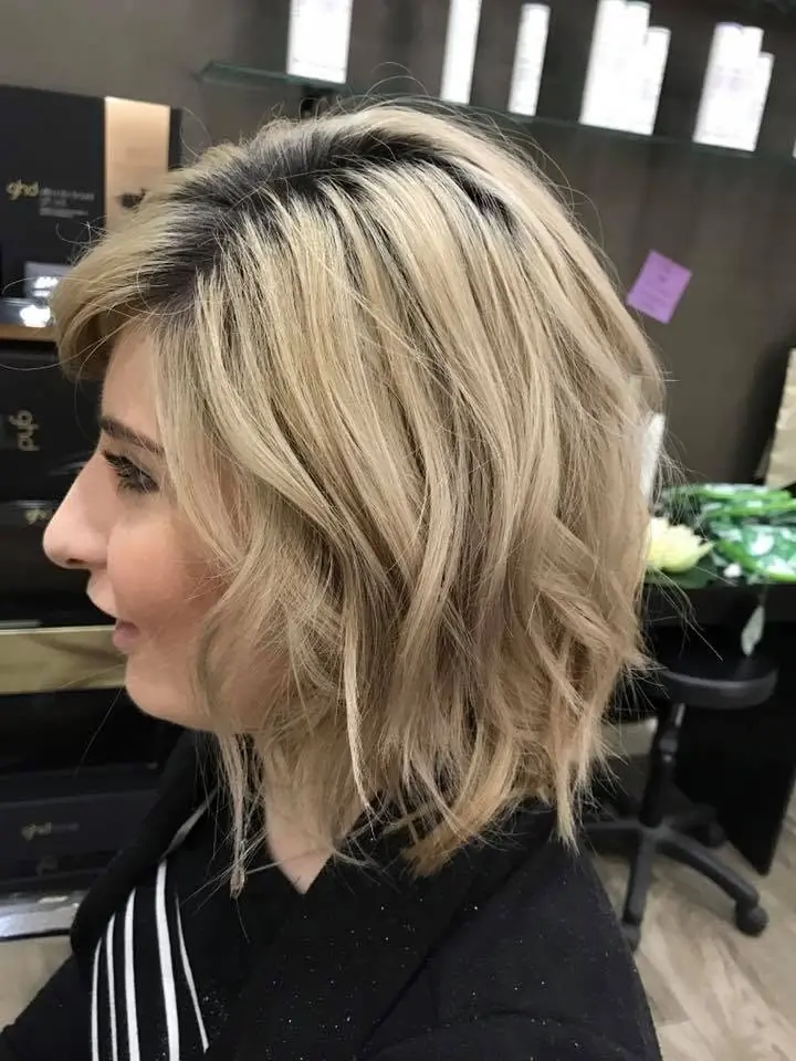 Short blonde textured bob viewed from the side