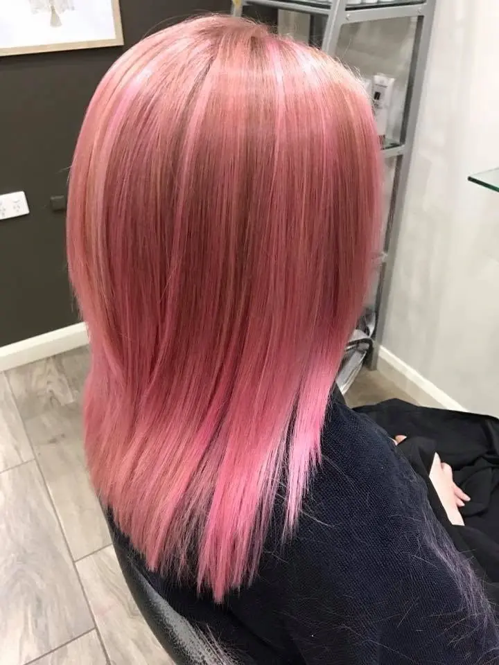 Straight shoulder-length pink hair viewed from the back
